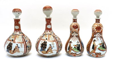 Lot 53 - A pair of Japanese Kutani bottle vases