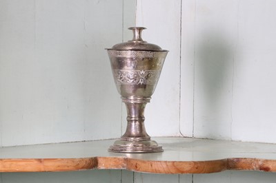 Lot 322 - An unmarked silver communion cup and paten