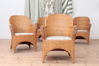 Lot 147 - A set of four rattan armchairs
