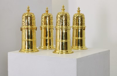 Lot 349 - A set of four silver-gilt reproduction lighthouse sugar casters