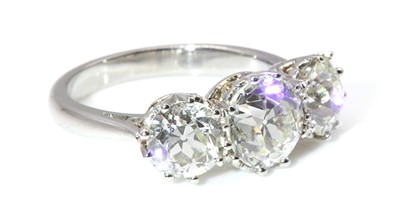 Lot 89 - A platinum three stone diamond  ring