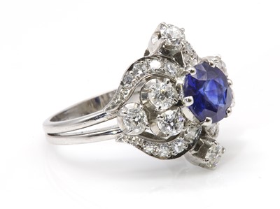 Lot 221 - A sapphire and diamond cocktail ring, c.1940