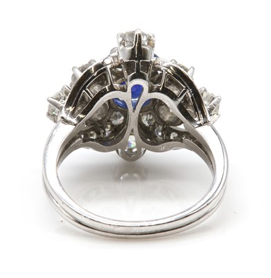 Lot 221 - A sapphire and diamond cocktail ring, c.1940