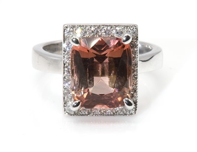 Lot 333 - A platinum tourmaline and diamond rectangular cluster ring