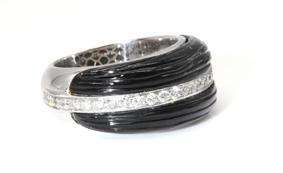 Lot 294 - A white gold carved onyx and diamond tapered band ring, attributed to Amanda Wakeley, c.2007