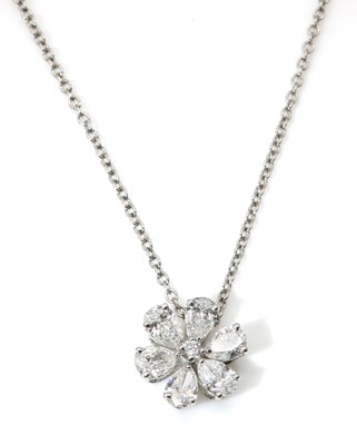 Lot 367 - A diamond set flower head cluster pendant