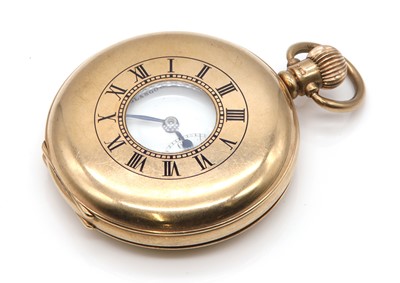 Lot 556 - A 9ct gold Swiss half hunter side wind pocket watch