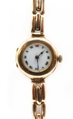 Lot 492 - A ladies' 15ct gold pin set mechanical bracelet watch