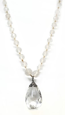 Lot 54 - An Arts & Crafts silver rock crystal quartz pendant