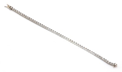 Lot 373 - A Continental diamond line bracelet