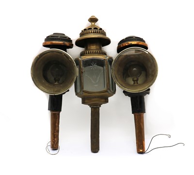 Lot 164 - A pair of copper mounted coach lamps