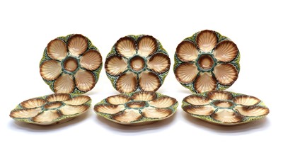 Lot 89A - A set of six French pottery oyster plates