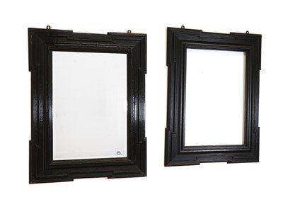 Lot 448 - An ebonised wall mirror and a matching frame