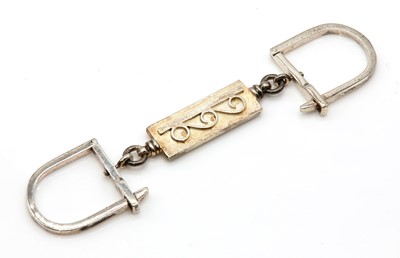 Lot 235 - A Greek silver double sided keyring, by Zolotas