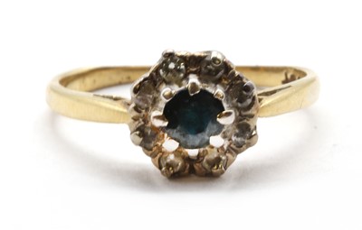 Lot 268 - A gold sapphire and diamond cluster ring