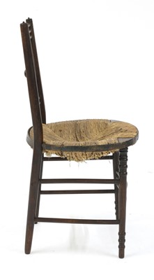 Lot 28 - An ebonised Arts and Crafts ash side chair