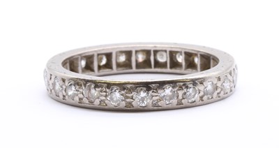 Lot 71 - A white gold diamond full eternity ring