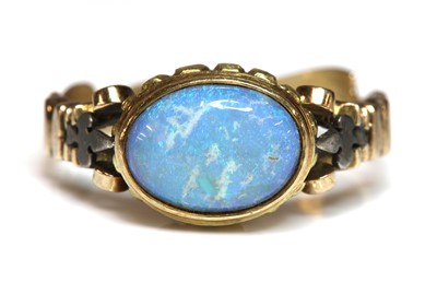 Lot 323 - An antique style single stone opal ring