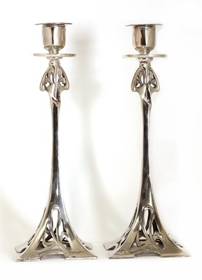 Lot 19 - A pair of WMF silver-plated candlesticks