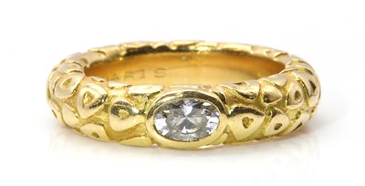 Lot 524 - A Chaumet diamond set band ring
