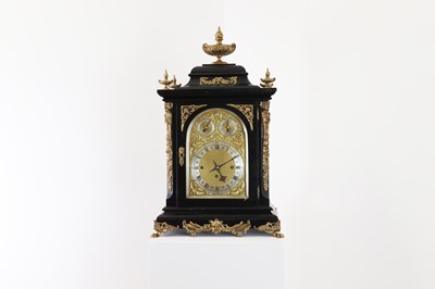 Lot 92 - An ebonised musical bracket clock
