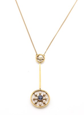 Lot 112 - An Edwardian sapphire and seed pearl pendant