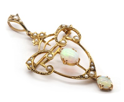 Lot 45 - An Edwardian gold opal and split pearl brooch/pendant