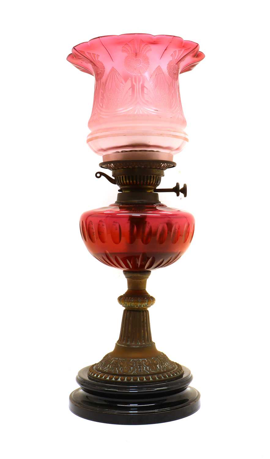 Lot 223 - A Victorian cranberry glass oil lamp