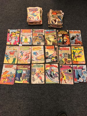 Lot 570 - A collection of eighty-eight DC comic books