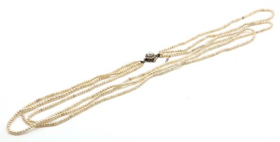 Lot 159 - A three row uniform pearl necklace
