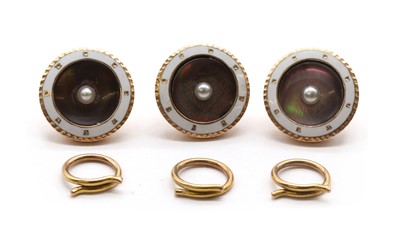 Lot 47 - A cased set of gold split pearl, mother-of-pearl and enamel buttons