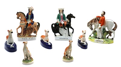 Lot 184 - A collection of Staffordshire pottery figures