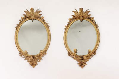 Lot 234 - A pair of giltwood wall mirrors