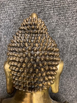 Lot 98 - A Chinese brass Buddha