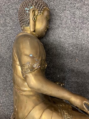 Lot 65 - A pair of Chinese brass Buddha