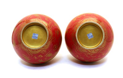Lot 133 - A pair of Chinese red-glazed tianqiuping