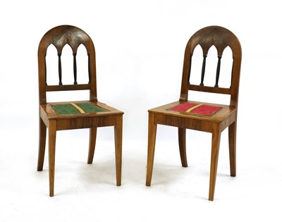 Lot 404 - A pair of walnut hall chairs