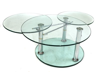 Lot 428 - A Draenert Intermezzo glass and chrome swivel low table