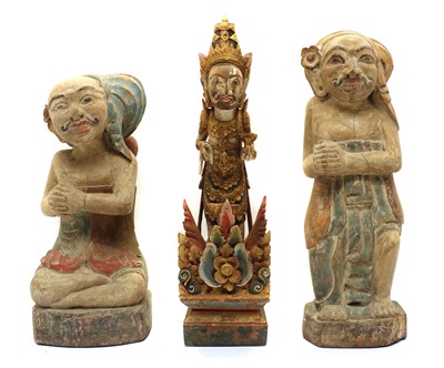 Lot 279 - A near pair of carved and polychrome Balinese figures