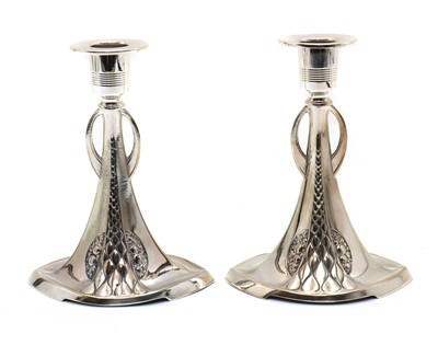 Lot 16 - A pair of WMF silver-plated candlesticks
