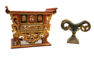 Lot 280 - A Chinese carved polychrome and gilt stand