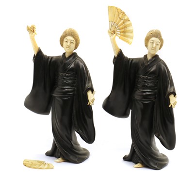 Lot 137 - A pair of Japanese bronze and ivory figures of ladies