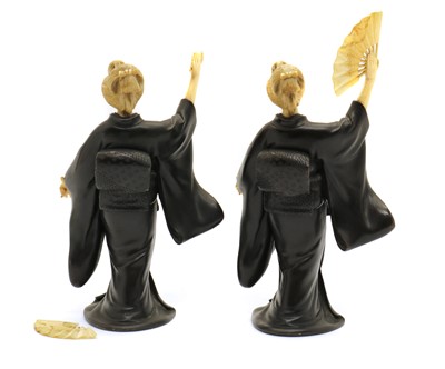 Lot 137 - A pair of Japanese bronze and ivory figures of ladies