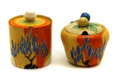 Lot 159 - A pair of Clarice Cliff 'Windbells' pattern preserve pots and covers