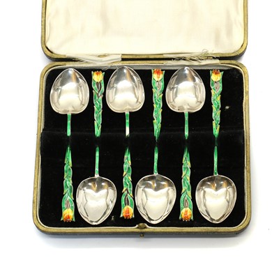 Lot 11 - A set of six Art Nouveau silver and enamel teaspoons
