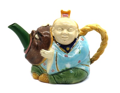Lot 162 - A Minton Majolica teapot and cover