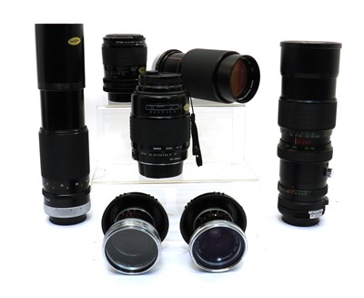 Lot 349 - A collection of camera lenses and lens accessories