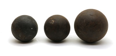 Lot 178 - A group of three cannonballs