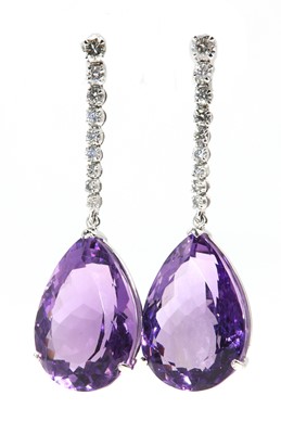 Lot 298 - A pair of 18ct white gold amethyst and diamond drop earrings