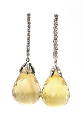 Lot 297 - A pair of 18ct white gold citrine and diamond drop earrings